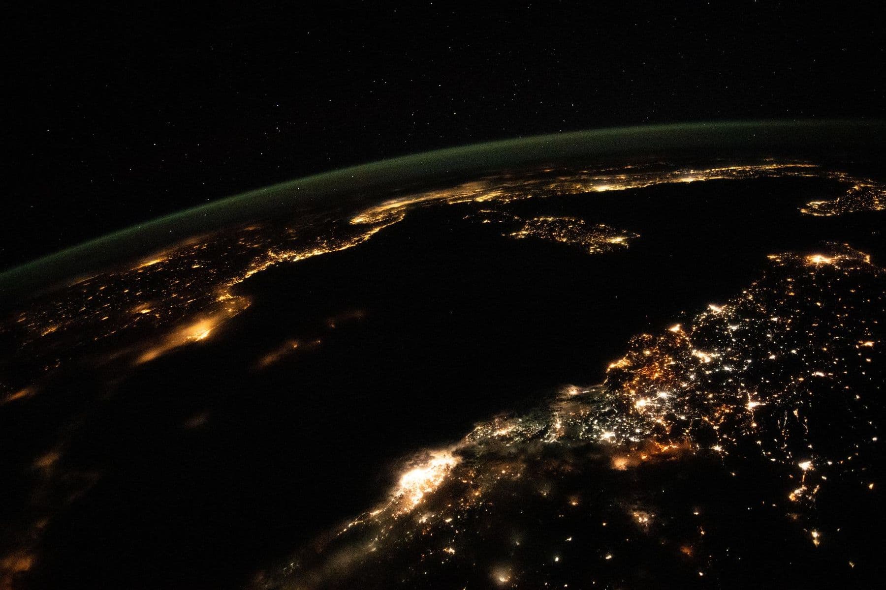 City lights at night photographed from the International Space Station